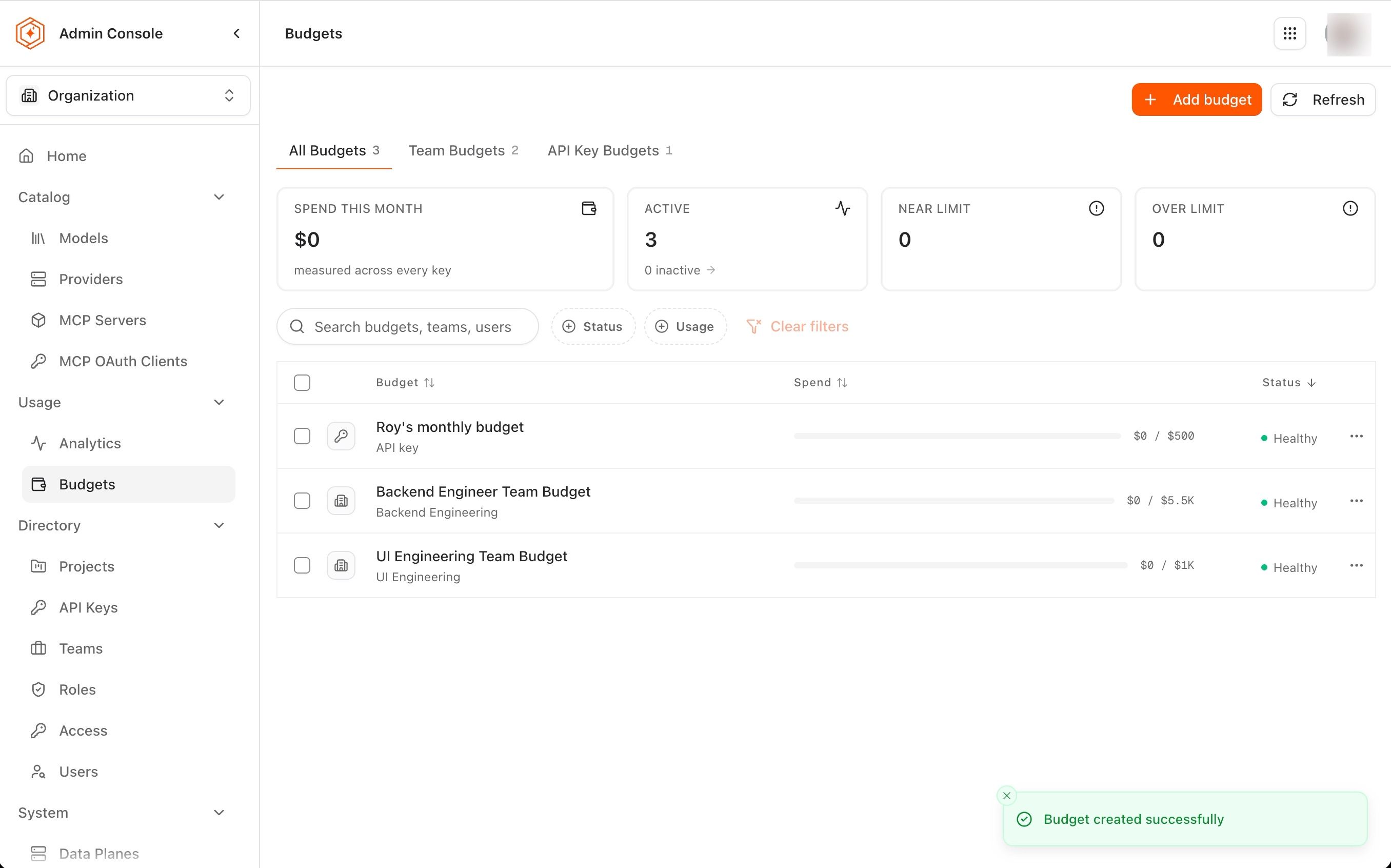 The Budgets page listing one API key budget and two team budgets, all healthy