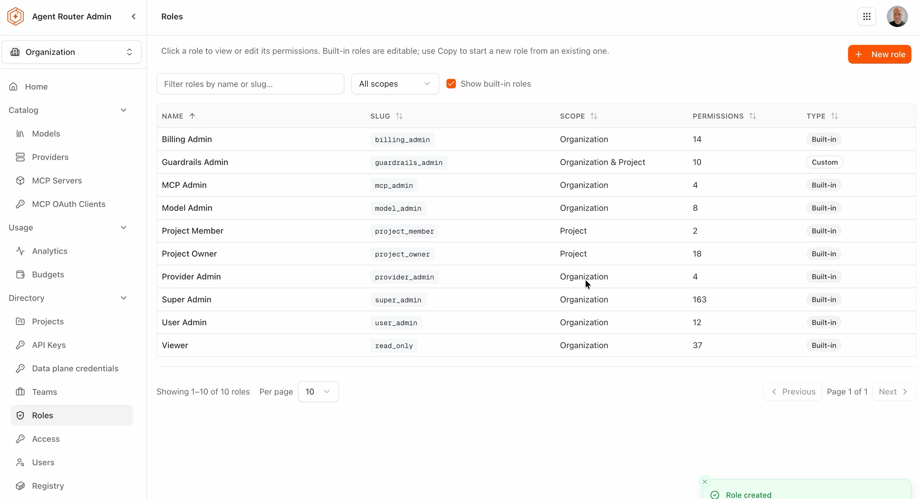 Roles page listing the new Guardrails Admin role as a custom role